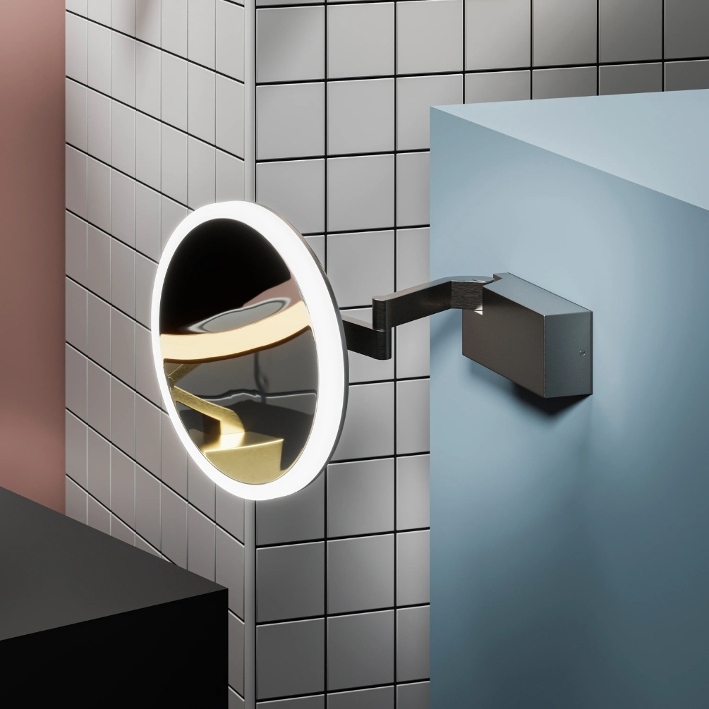 Lifestyle image of the hib. Cirque Gunmetal LED Magnifying Mirror